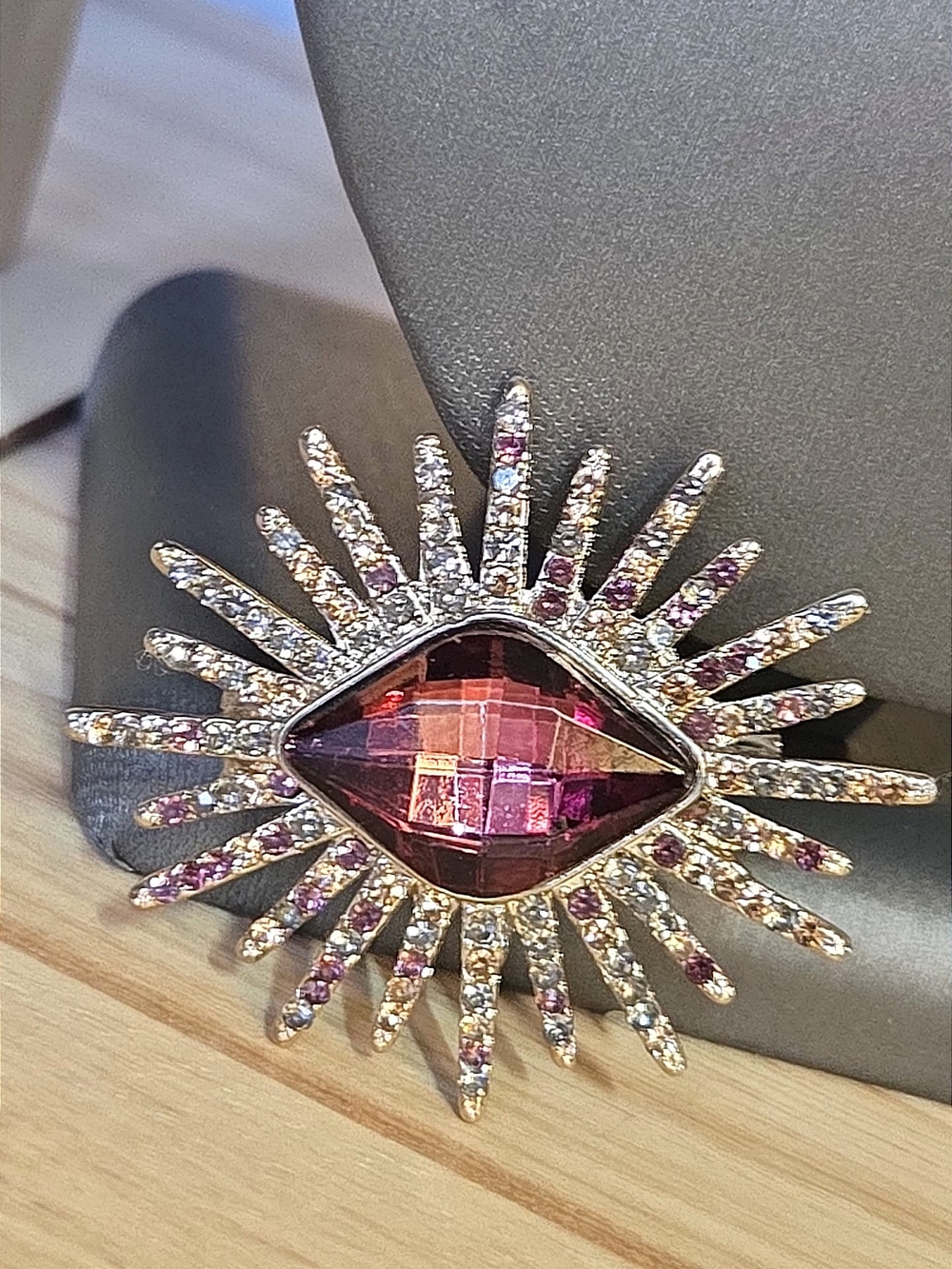 Purple/deep Red Crystal Sunburst Brooch with Sparkling Accents